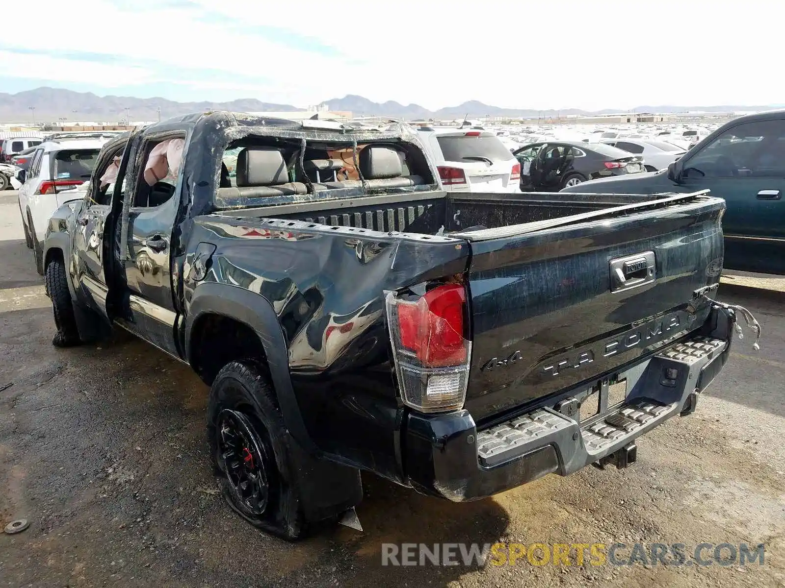 3 Photograph of a damaged car 5TFCZ5AN9KX211511 TOYOTA TACOMA 2019