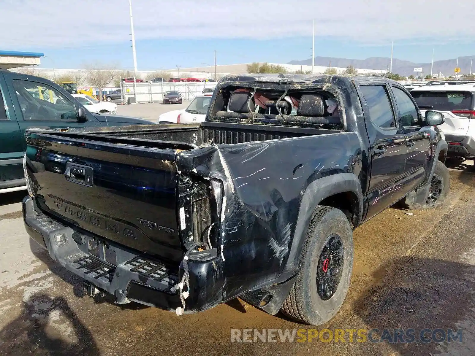 4 Фотография поврежденного автомобиля 5TFCZ5AN9KX211511 TOYOTA TACOMA 2019