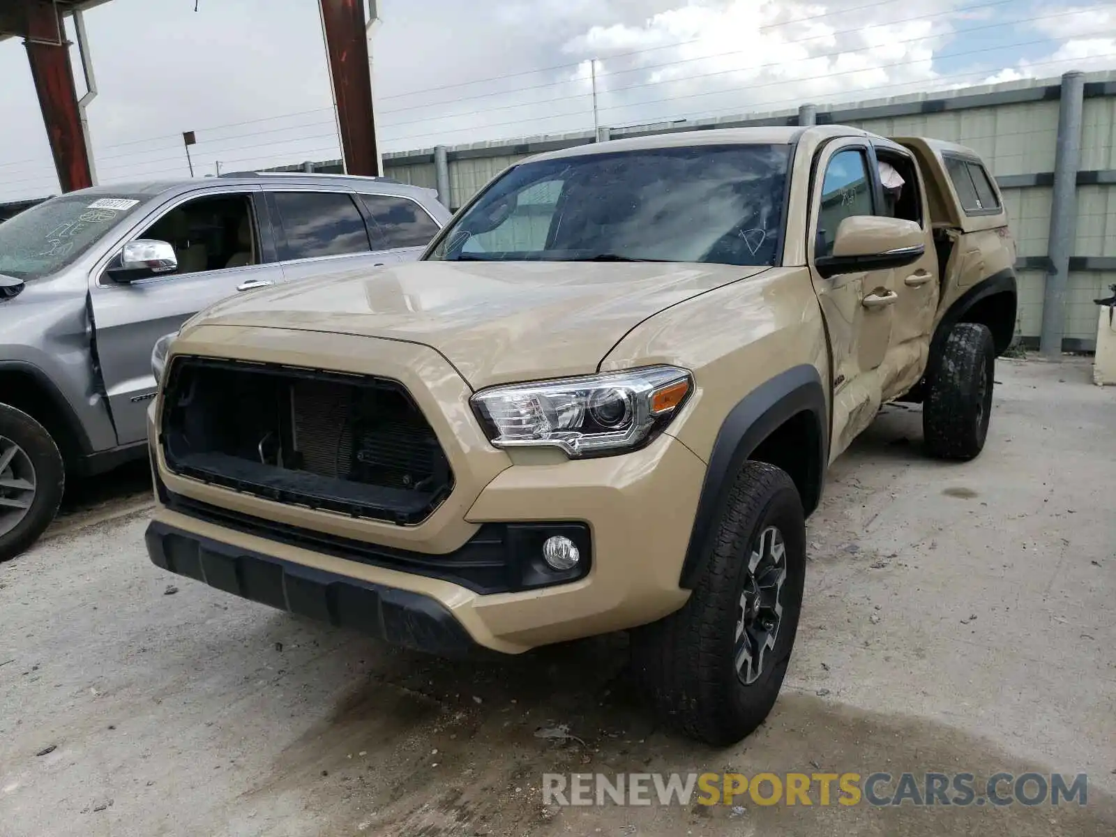 2 Photograph of a damaged car 5TFCZ5ANXKX180981 TOYOTA TACOMA 2019