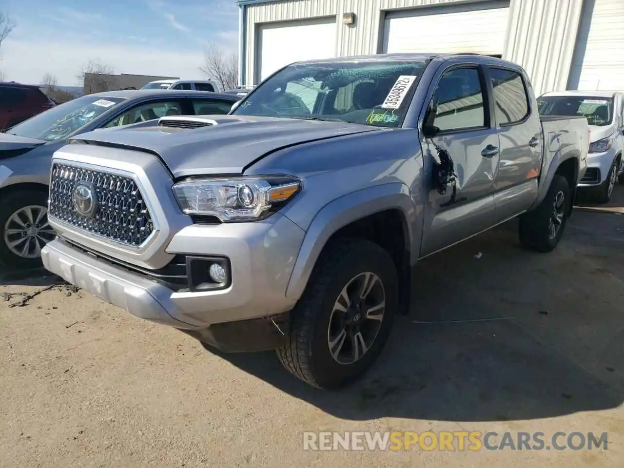 2 Photograph of a damaged car 5TFCZ5ANXKX182486 TOYOTA TACOMA 2019