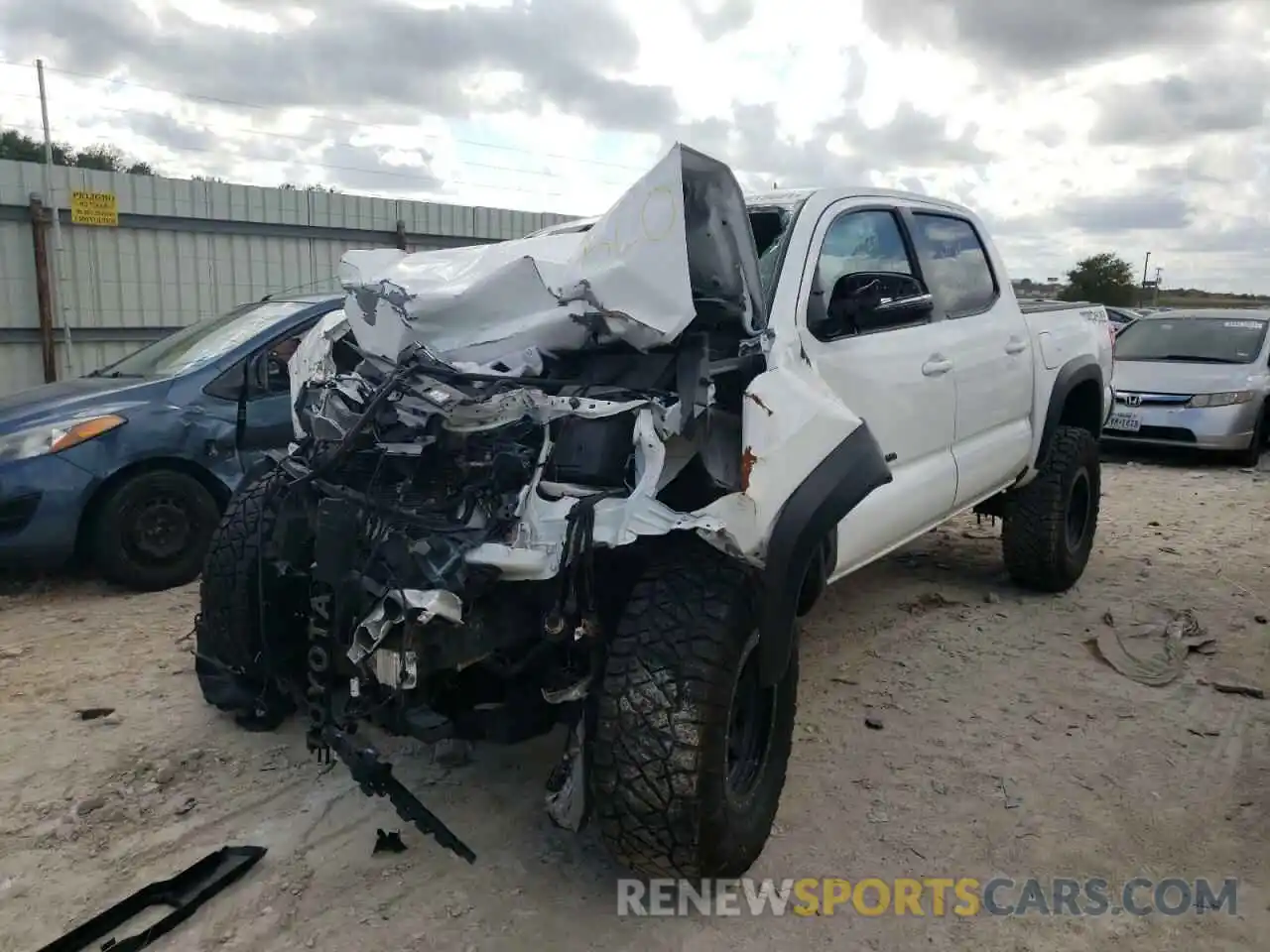 2 Photograph of a damaged car 5TFCZ5ANXKX192323 TOYOTA TACOMA 2019