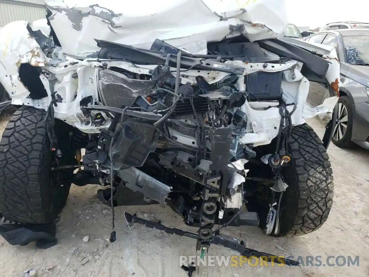 7 Photograph of a damaged car 5TFCZ5ANXKX192323 TOYOTA TACOMA 2019