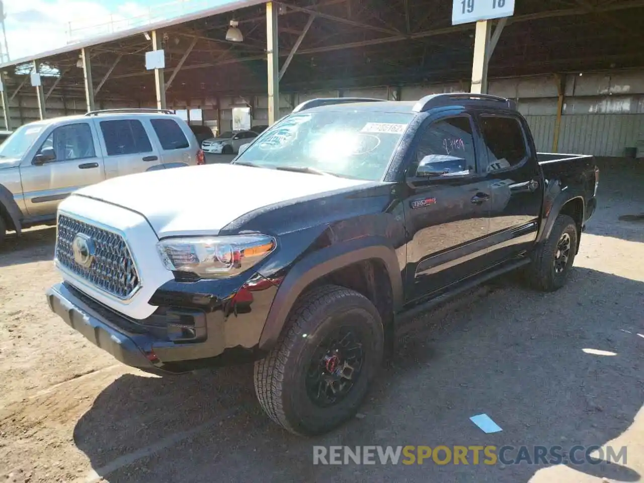 2 Photograph of a damaged car 5TFCZ5ANXKX193858 TOYOTA TACOMA 2019