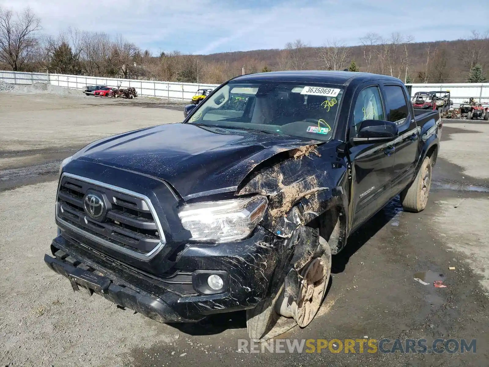 2 Photograph of a damaged car 5TFCZ5ANXKX194752 TOYOTA TACOMA 2019