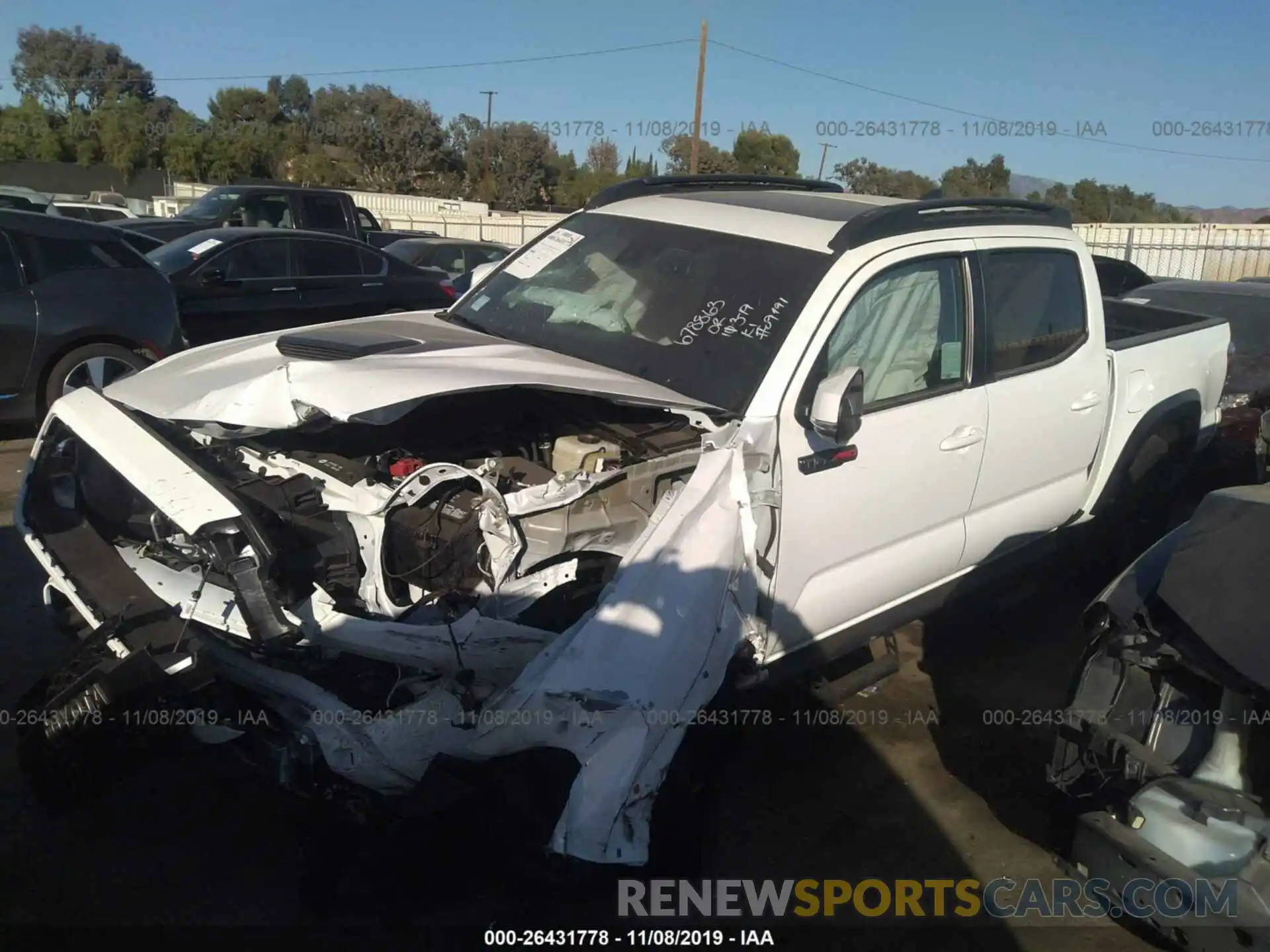 2 Photograph of a damaged car 5TFCZ5ANXKX198414 TOYOTA TACOMA 2019