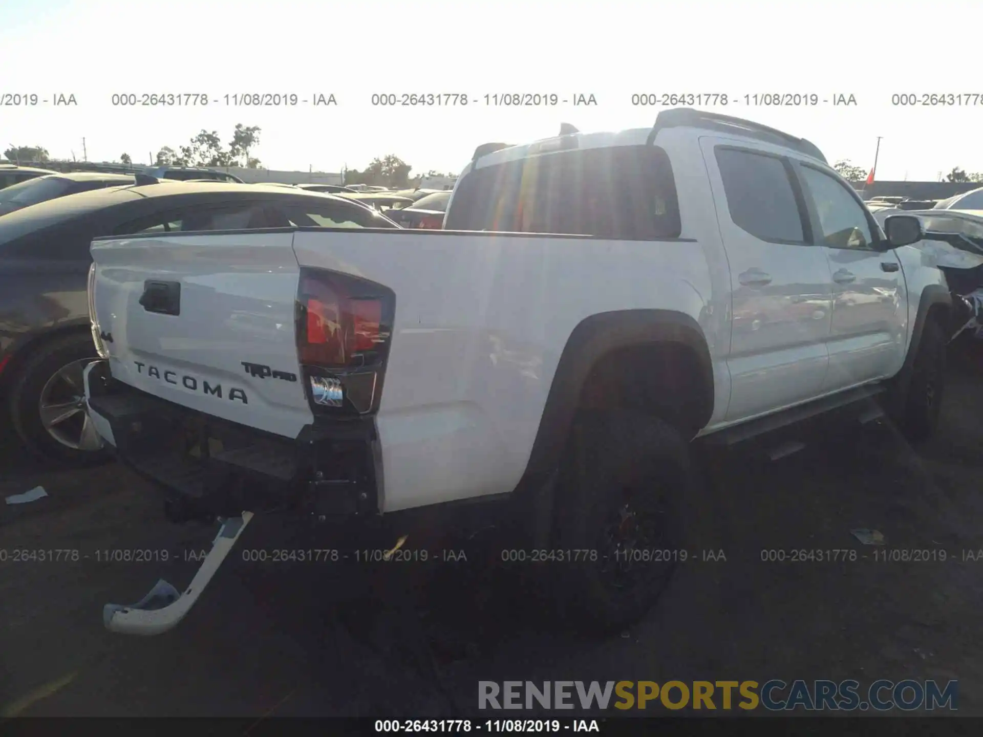 4 Photograph of a damaged car 5TFCZ5ANXKX198414 TOYOTA TACOMA 2019