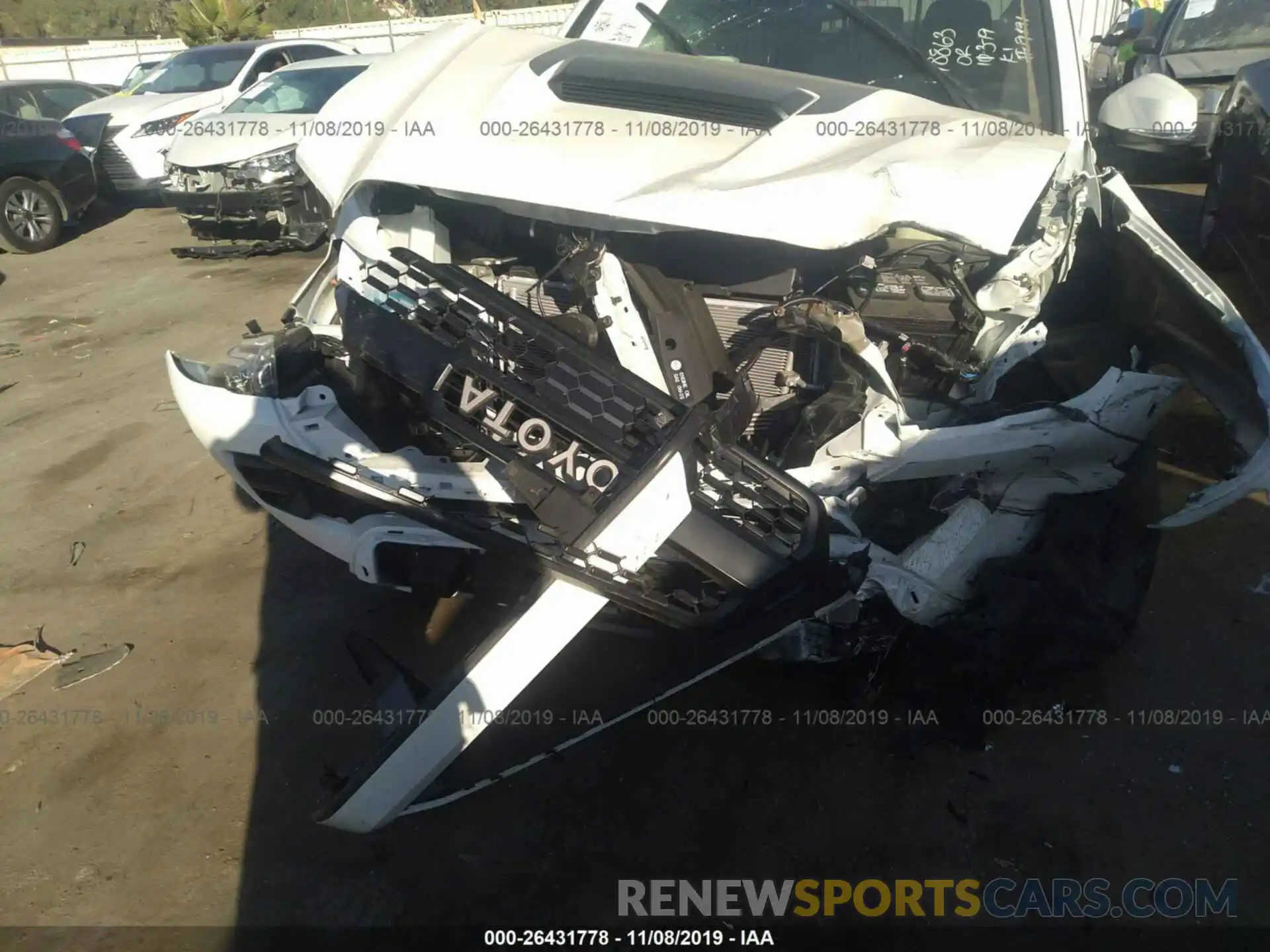 6 Photograph of a damaged car 5TFCZ5ANXKX198414 TOYOTA TACOMA 2019