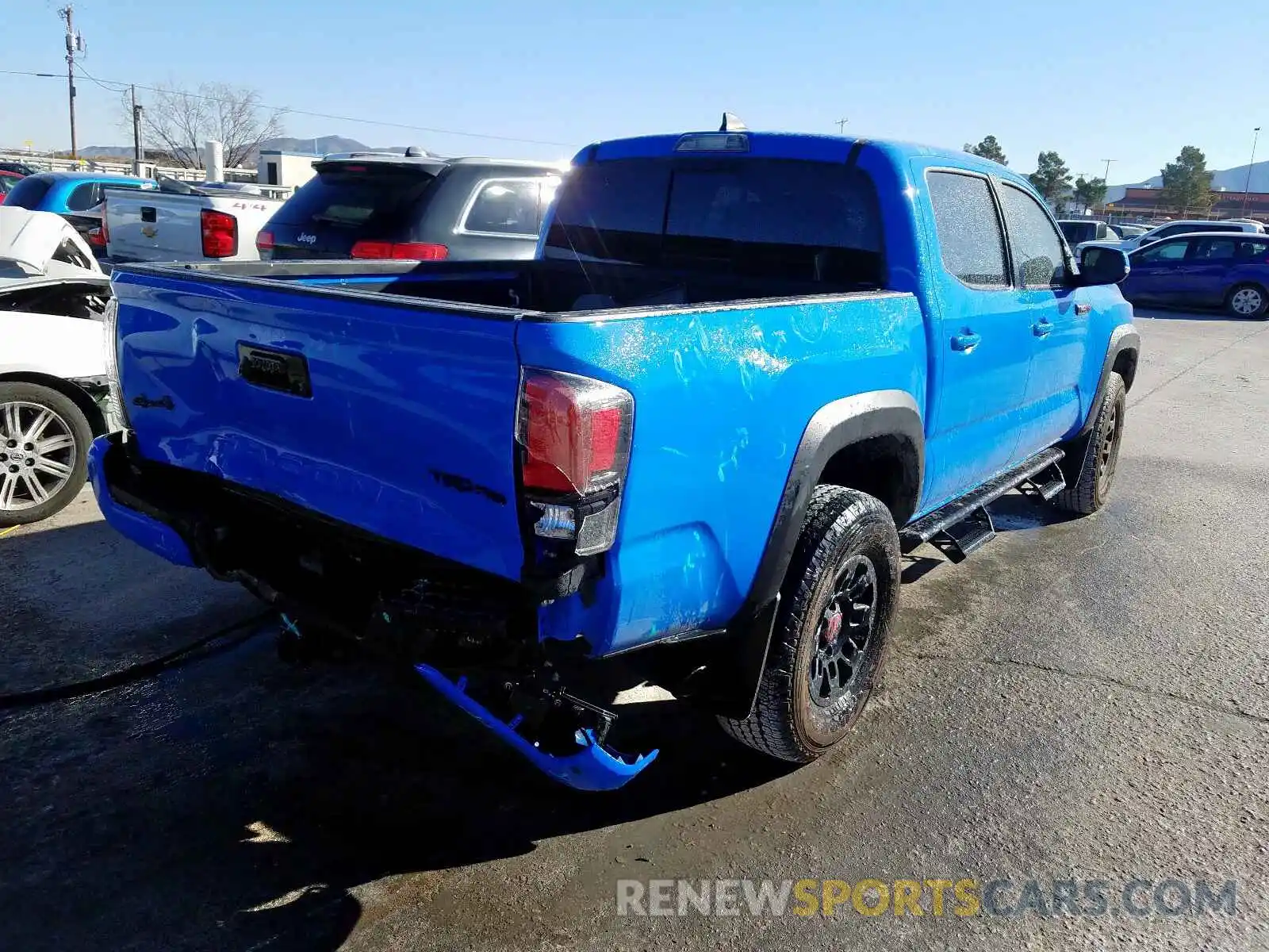 4 Photograph of a damaged car 5TFCZ5ANXKX199966 TOYOTA TACOMA 2019