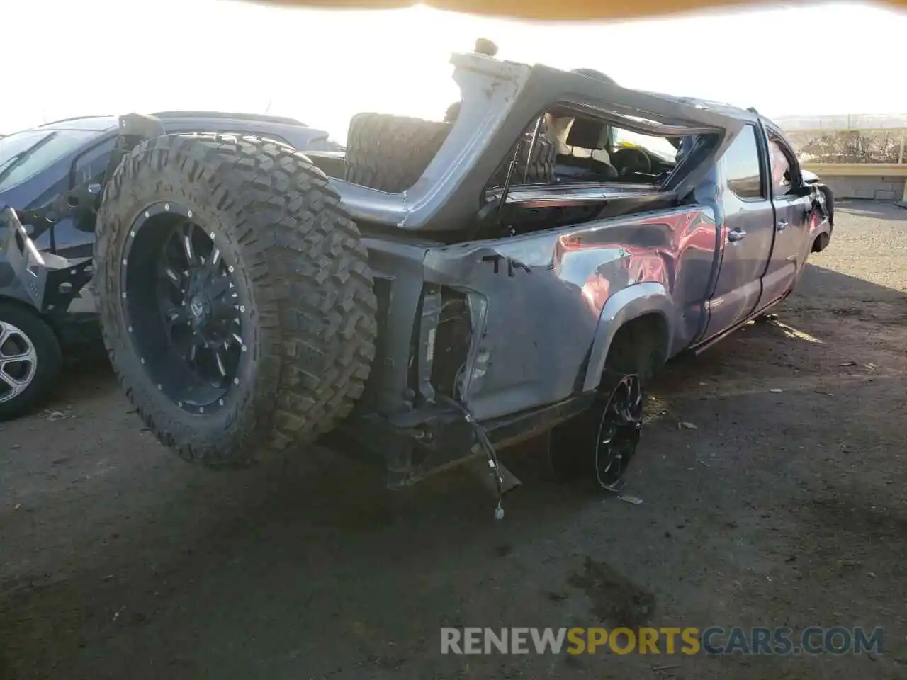 4 Photograph of a damaged car 5TFDZ5BN3KX042766 TOYOTA TACOMA 2019