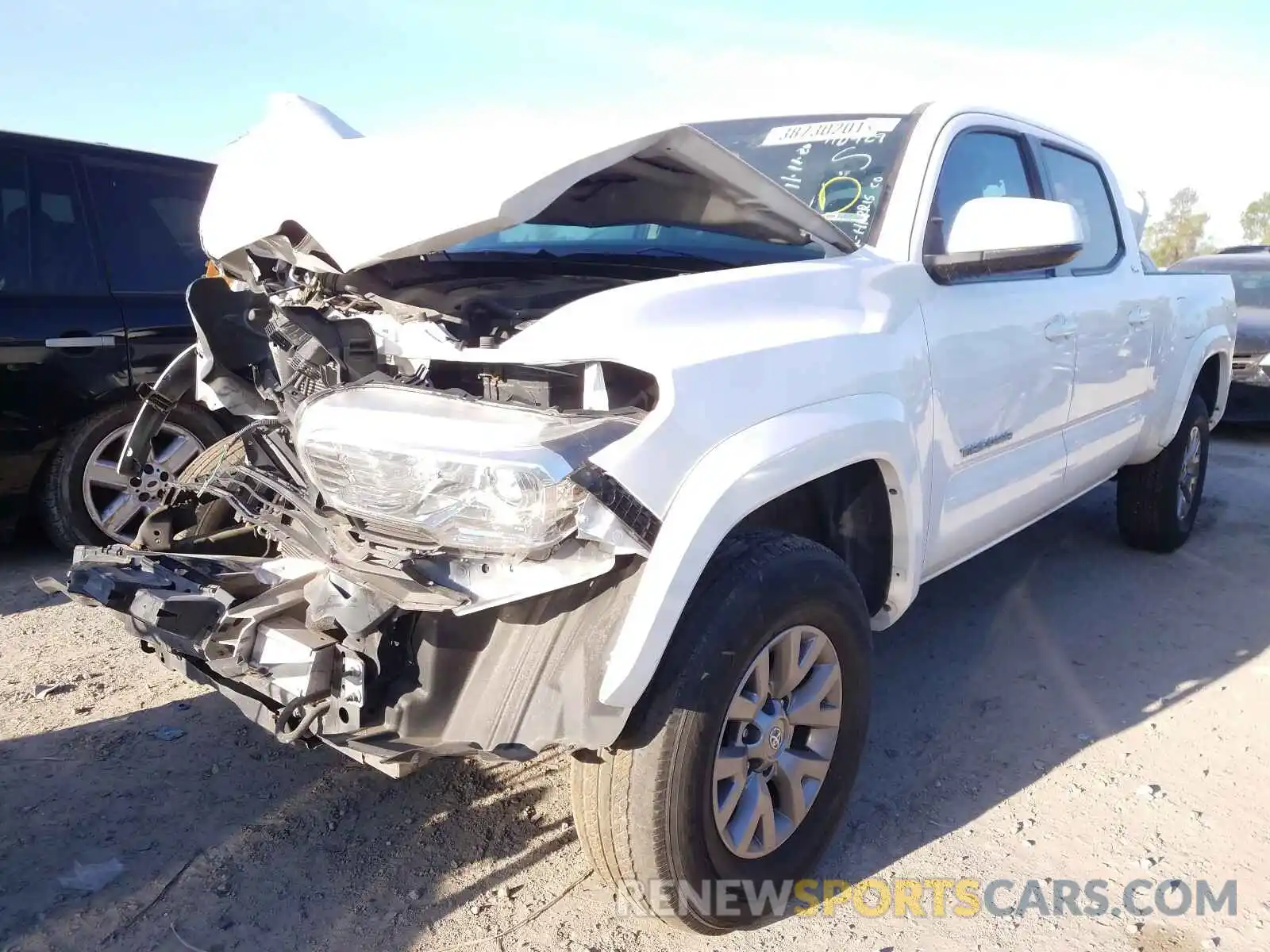 2 Photograph of a damaged car 5TFDZ5BNXKX038813 TOYOTA TACOMA 2019