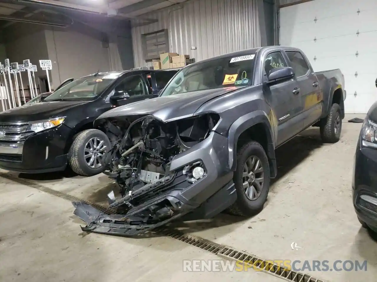 2 Photograph of a damaged car 5TFDZ5BNXKX043879 TOYOTA TACOMA 2019