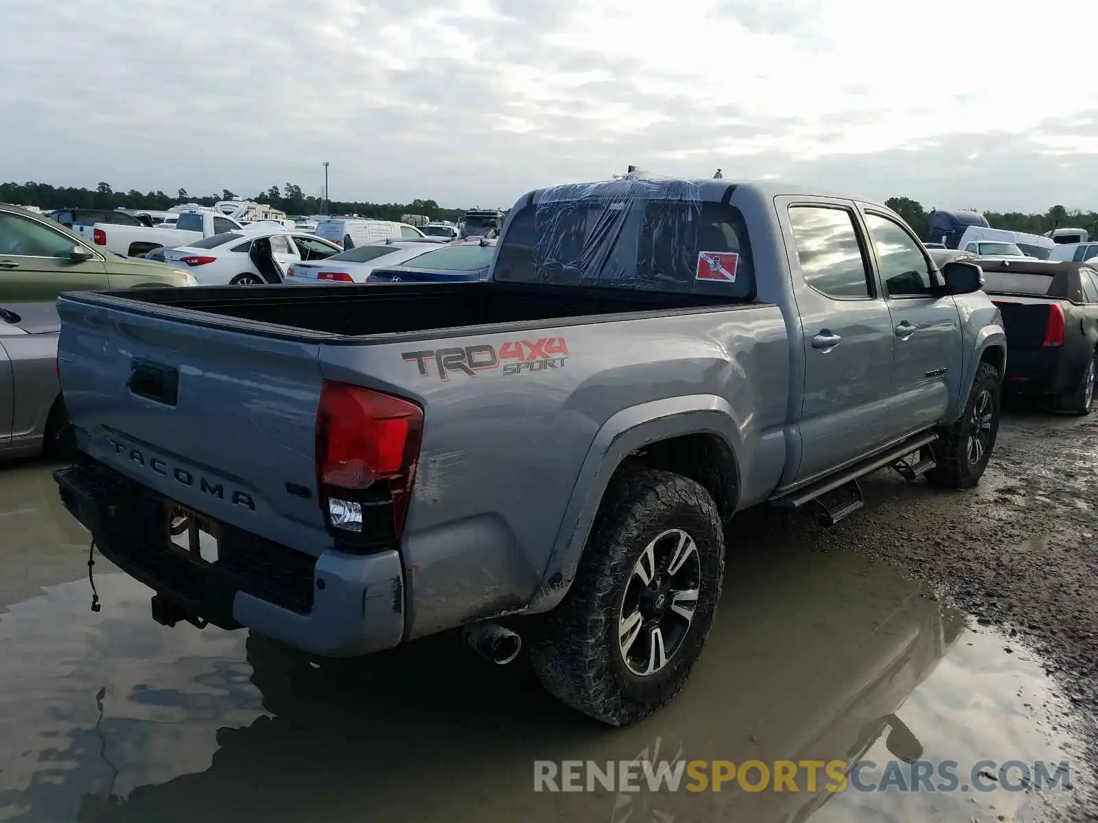 4 Photograph of a damaged car 5TFDZ5BNXKX046197 TOYOTA TACOMA 2019