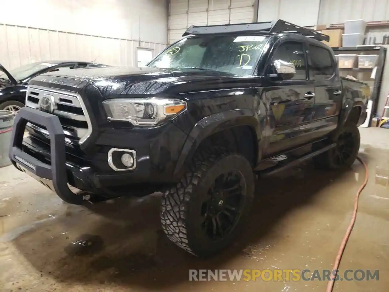 2 Photograph of a damaged car 5TFEZ5CN2KX078709 TOYOTA TACOMA 2019