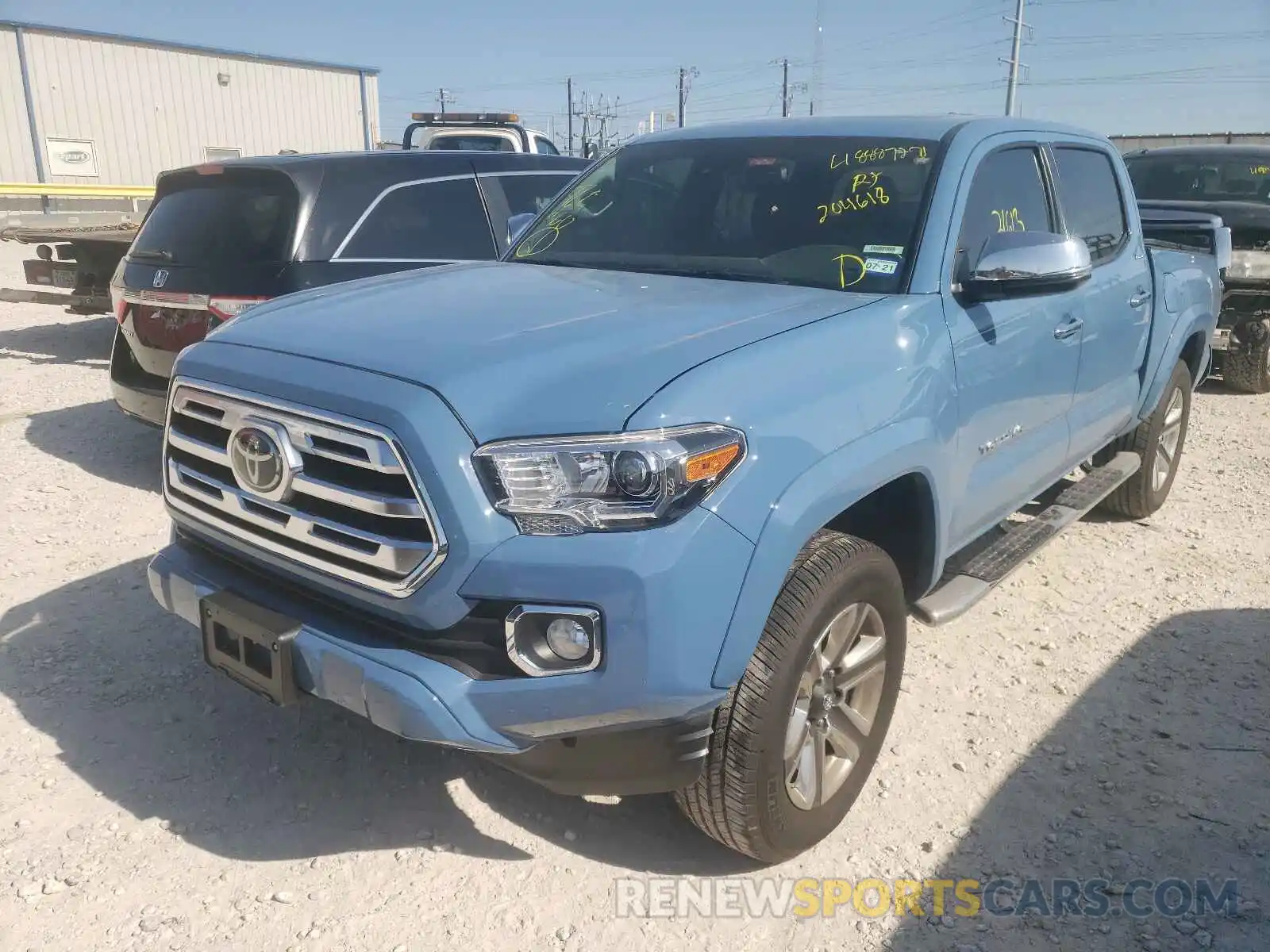 2 Photograph of a damaged car 5TFGZ5AN1KX204618 TOYOTA TACOMA 2019