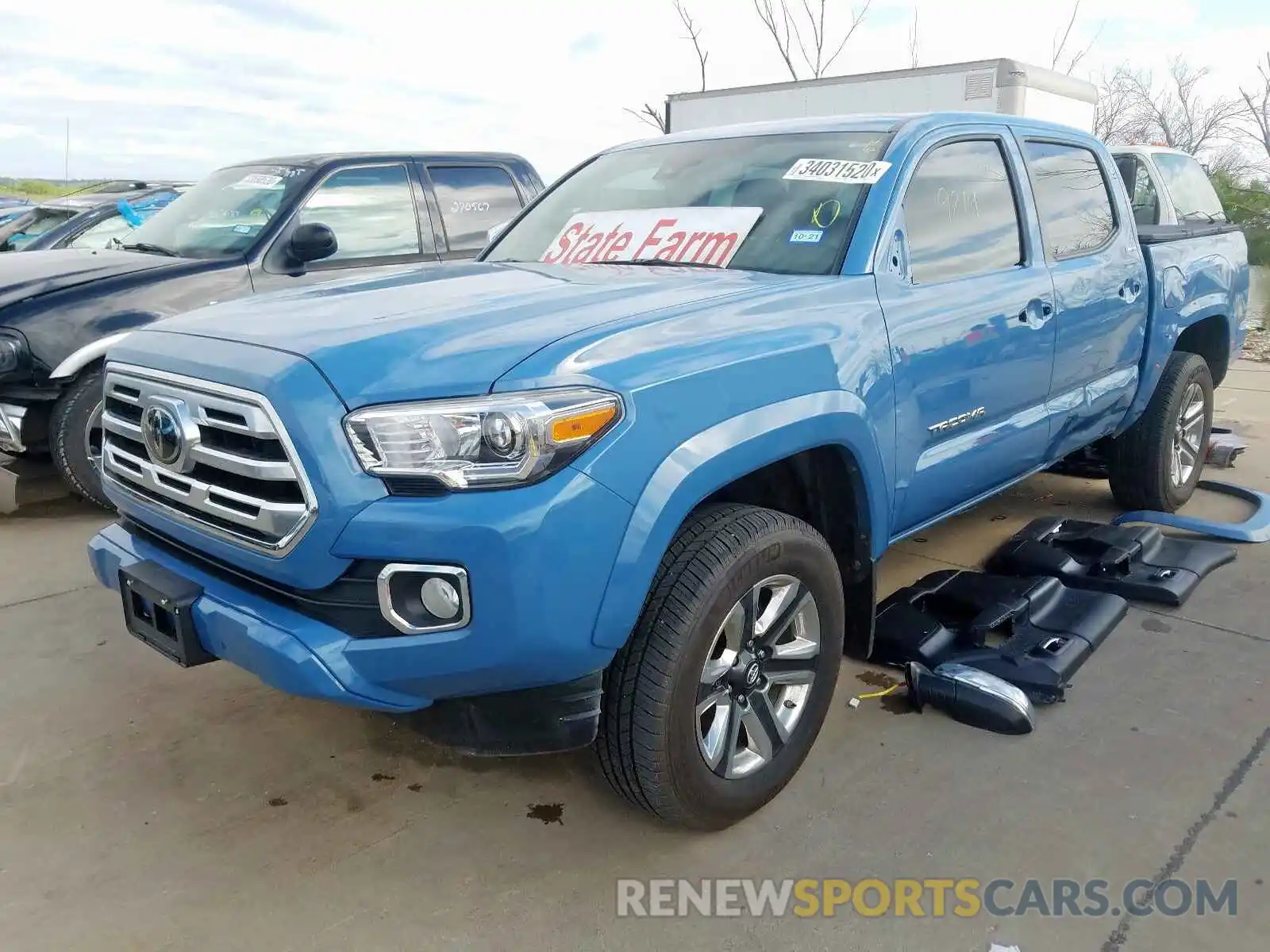 2 Photograph of a damaged car 5TFGZ5AN9KX211607 TOYOTA TACOMA 2019