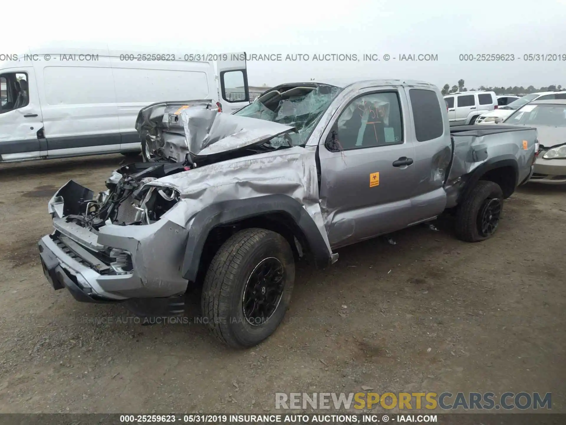 2 Photograph of a damaged car 5TFRX5GN0KX137743 TOYOTA TACOMA 2019