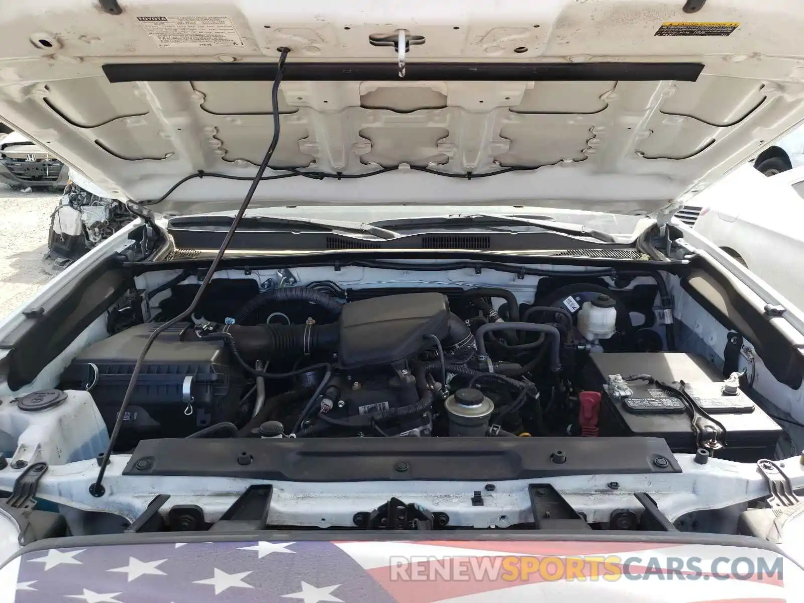 7 Photograph of a damaged car 5TFRX5GN0KX152811 TOYOTA TACOMA 2019