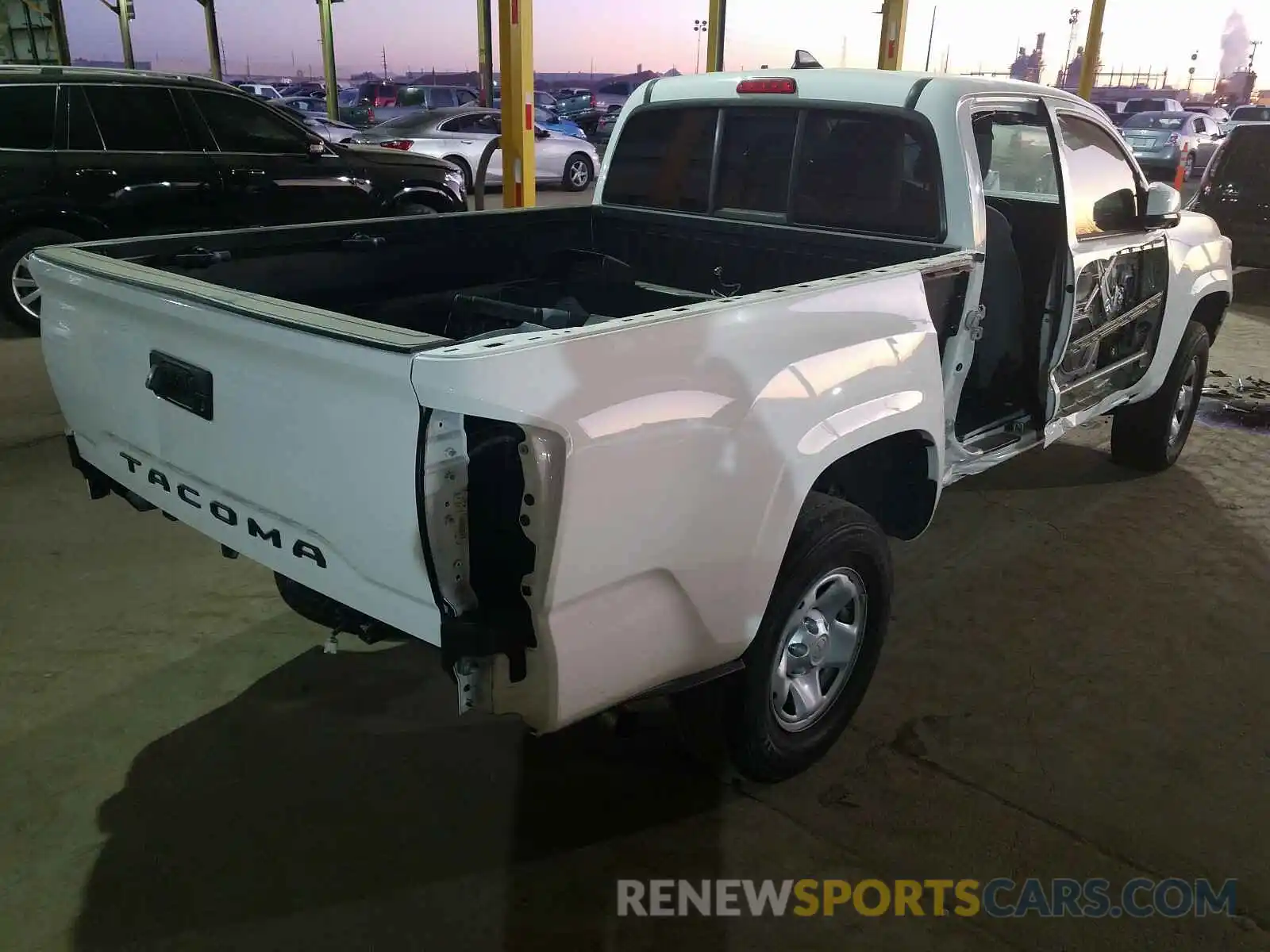 4 Photograph of a damaged car 5TFRX5GN0KX154915 TOYOTA TACOMA 2019