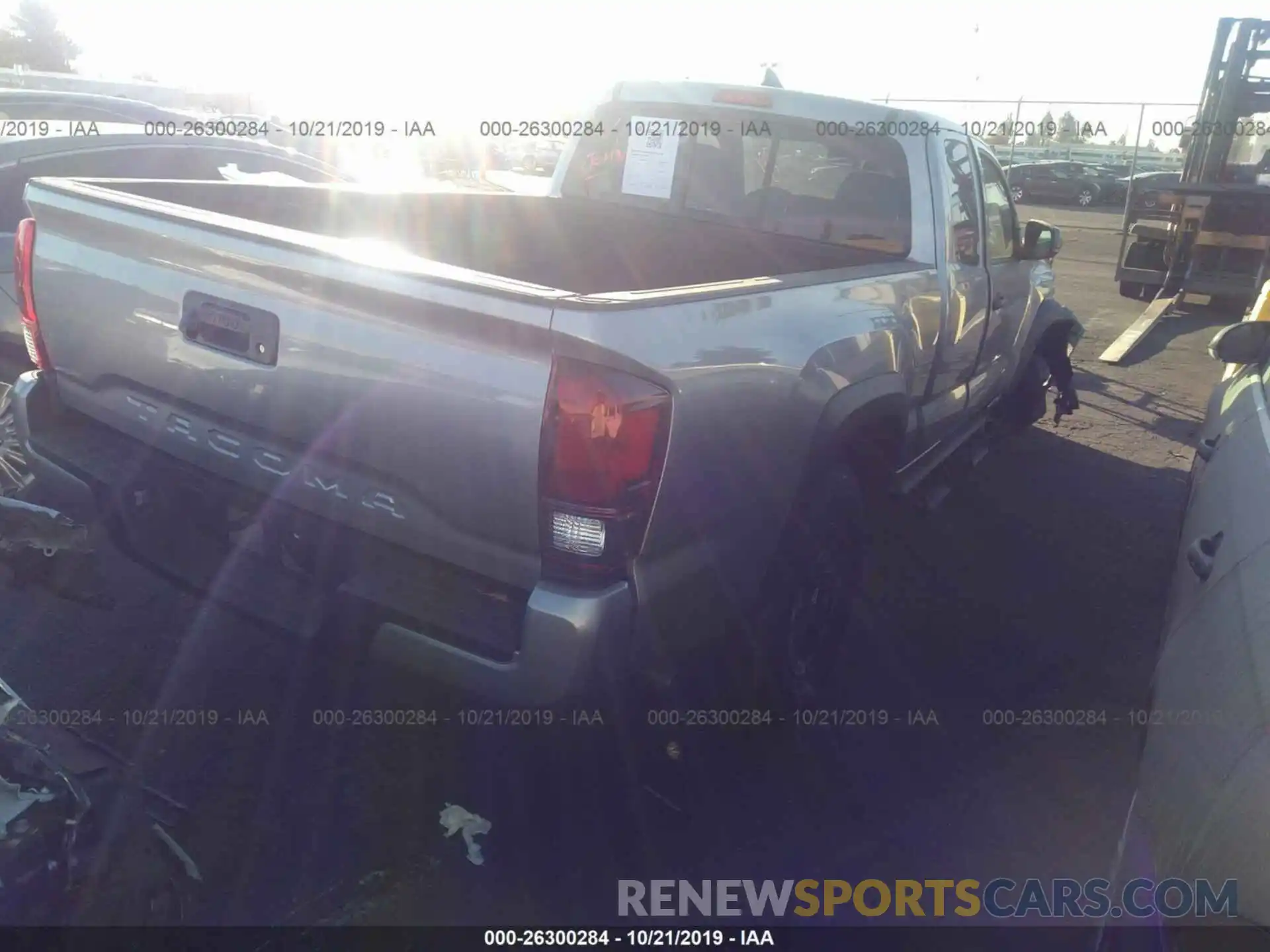 4 Photograph of a damaged car 5TFRX5GN0KX162884 TOYOTA TACOMA 2019