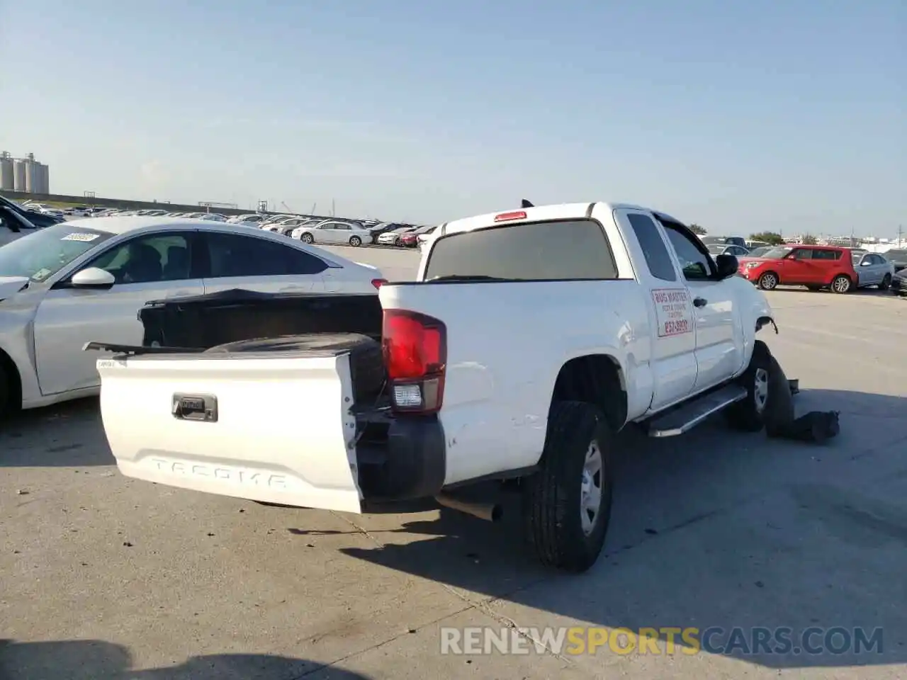 4 Photograph of a damaged car 5TFRX5GN1KX135256 TOYOTA TACOMA 2019