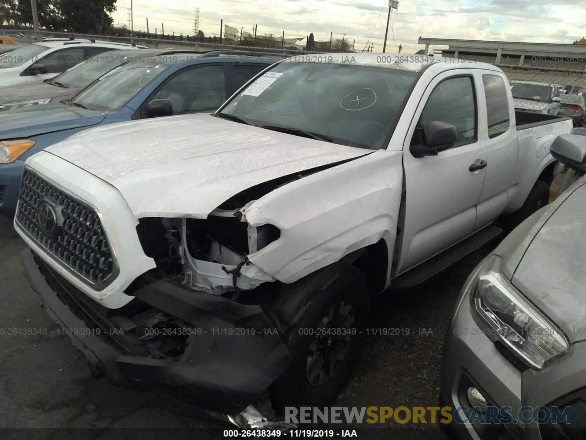 4 Photograph of a damaged car 5TFRX5GN1KX138254 TOYOTA TACOMA 2019