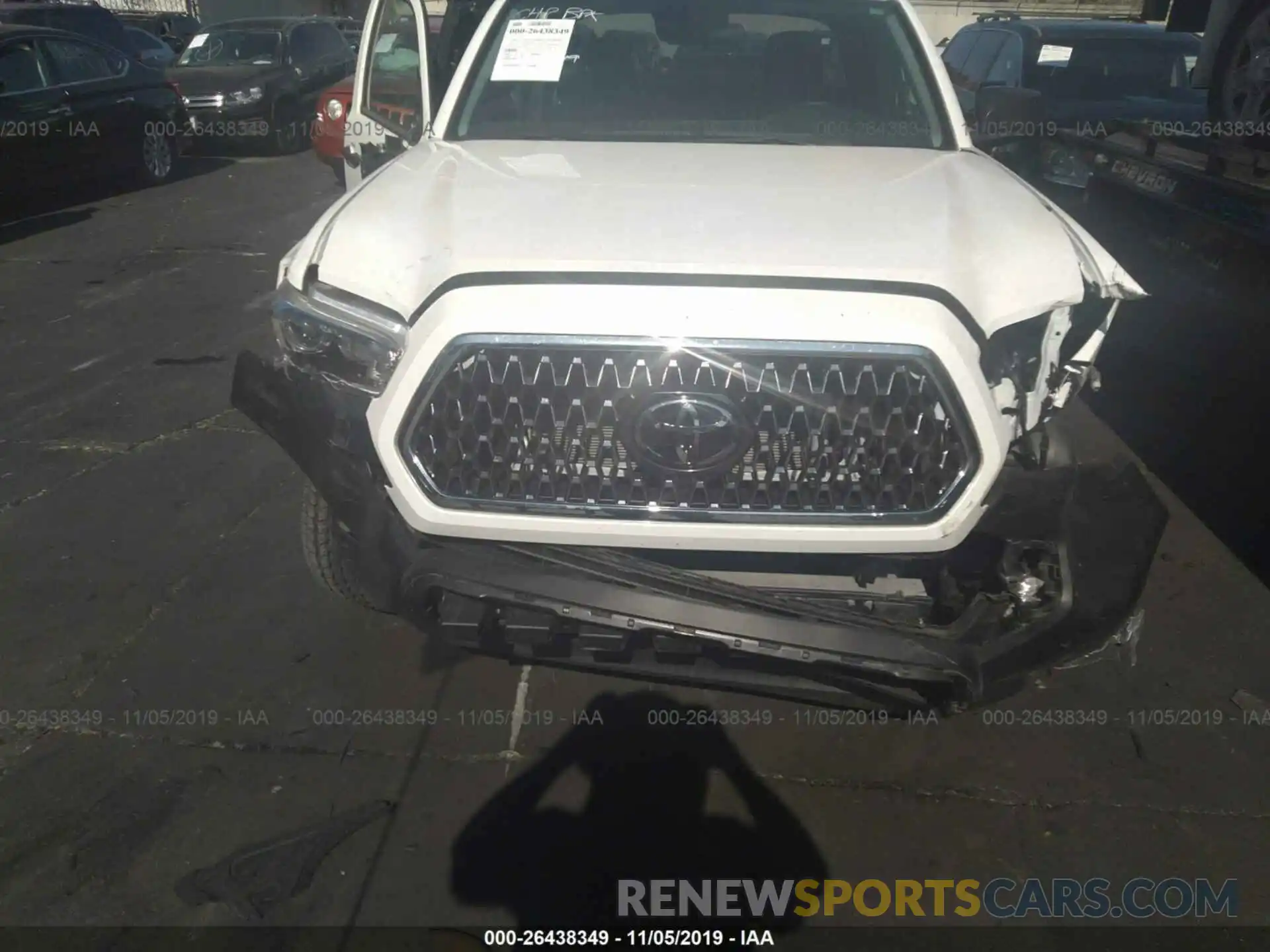 6 Photograph of a damaged car 5TFRX5GN1KX138254 TOYOTA TACOMA 2019