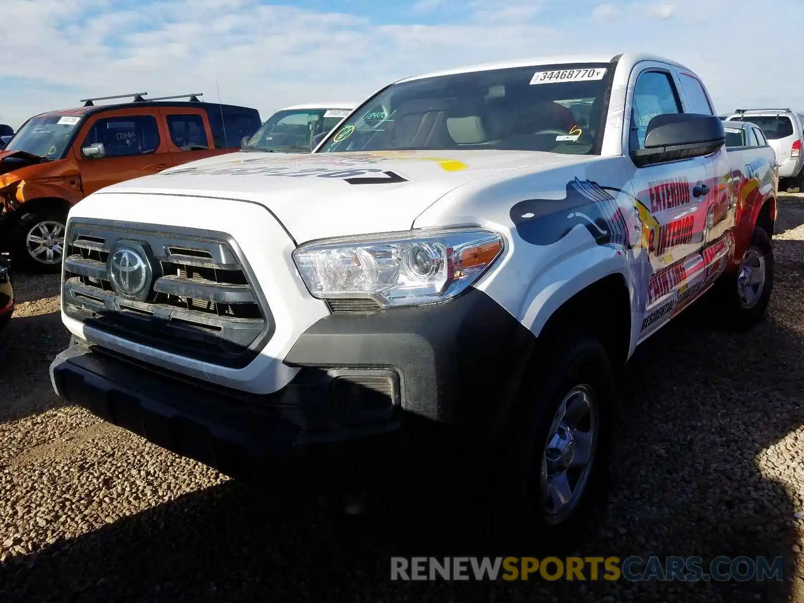 2 Photograph of a damaged car 5TFRX5GN1KX141977 TOYOTA TACOMA 2019