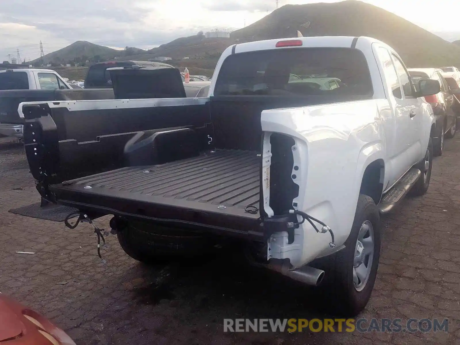 4 Photograph of a damaged car 5TFRX5GN1KX151702 TOYOTA TACOMA 2019