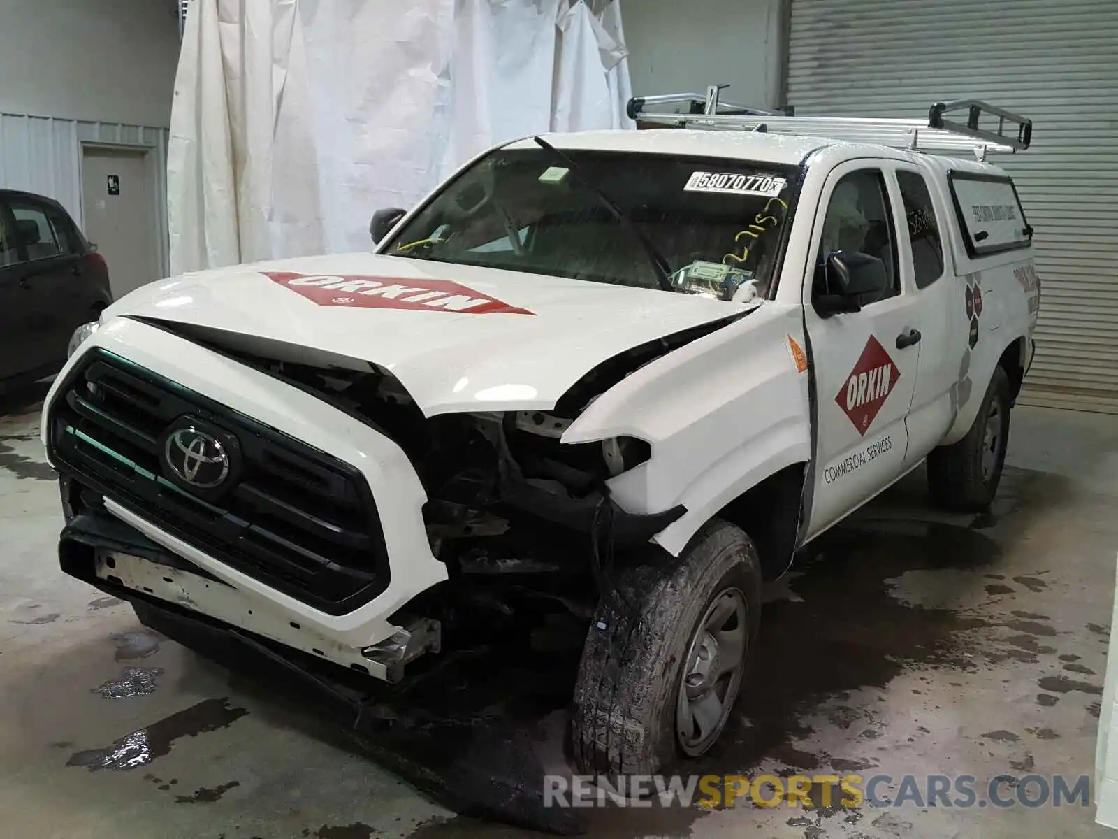 2 Photograph of a damaged car 5TFRX5GN1KX153269 TOYOTA TACOMA 2019