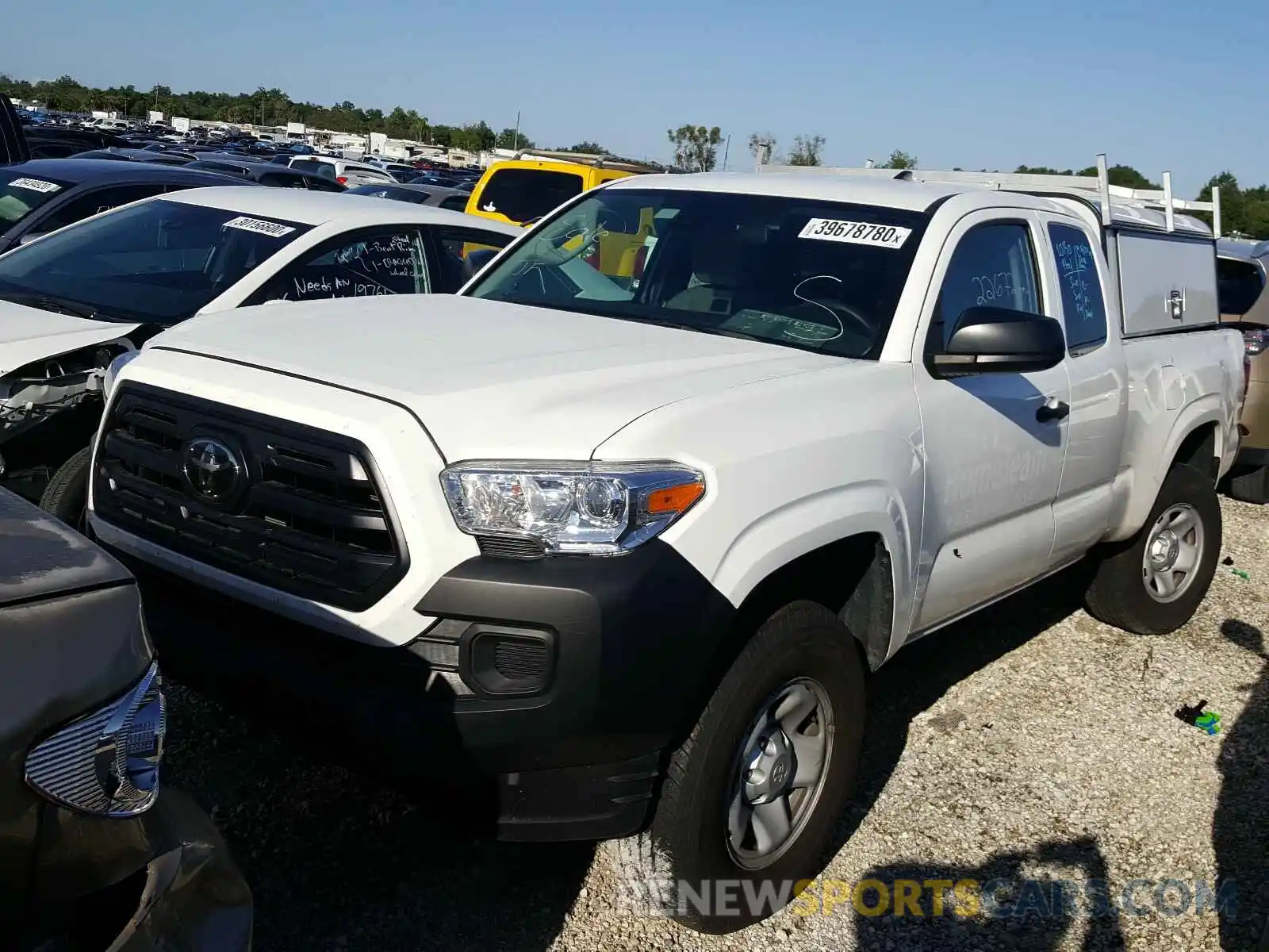 2 Photograph of a damaged car 5TFRX5GN1KX155748 TOYOTA TACOMA 2019