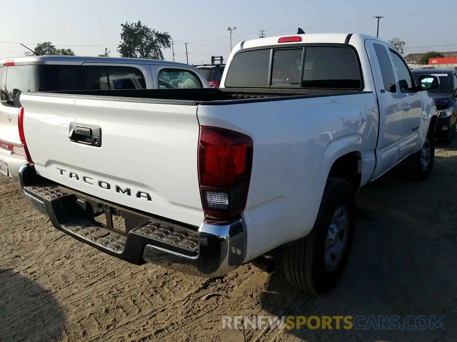 4 Photograph of a damaged car 5TFRX5GN1KX156012 TOYOTA TACOMA 2019