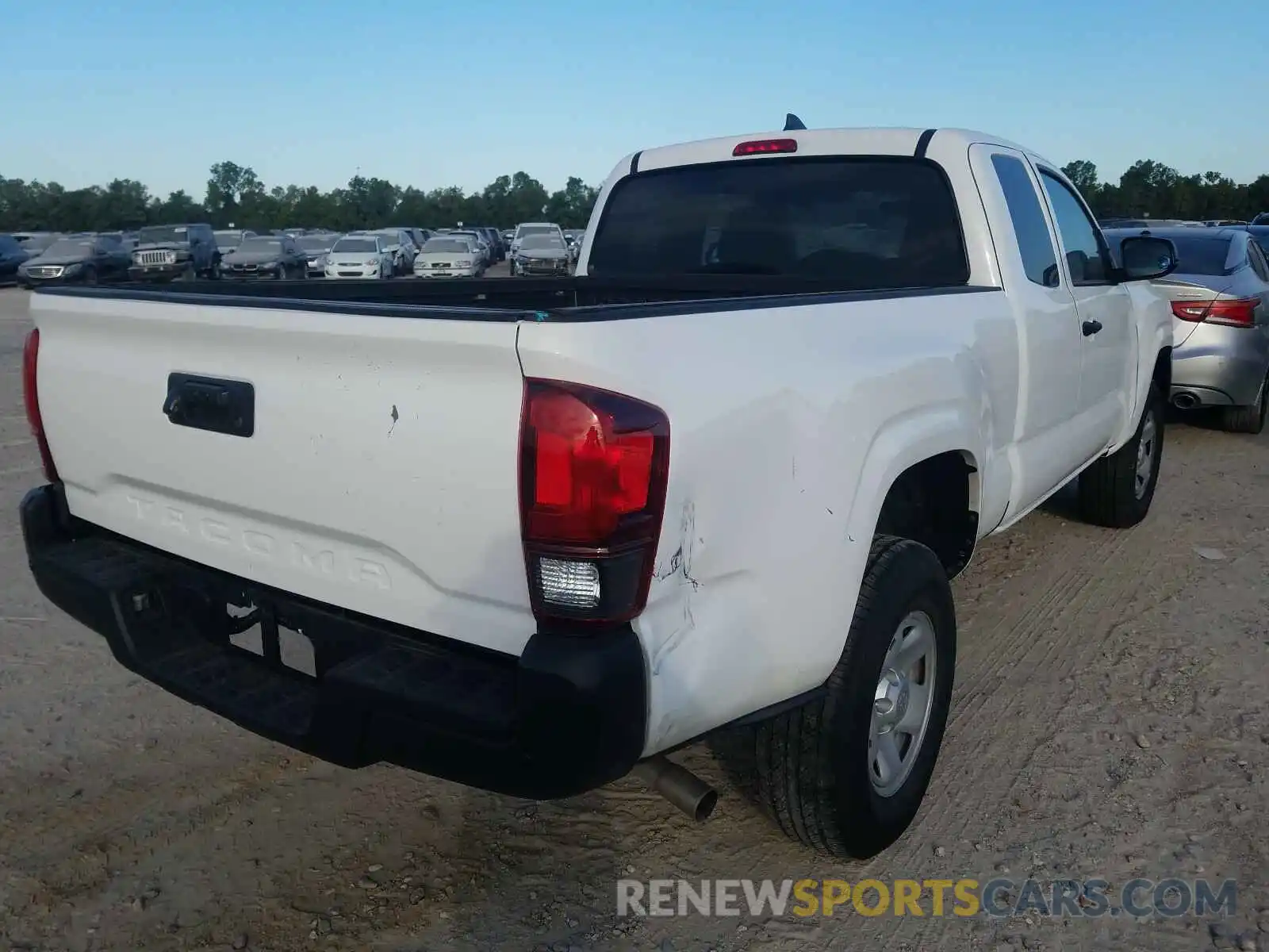 4 Photograph of a damaged car 5TFRX5GN1KX163106 TOYOTA TACOMA 2019