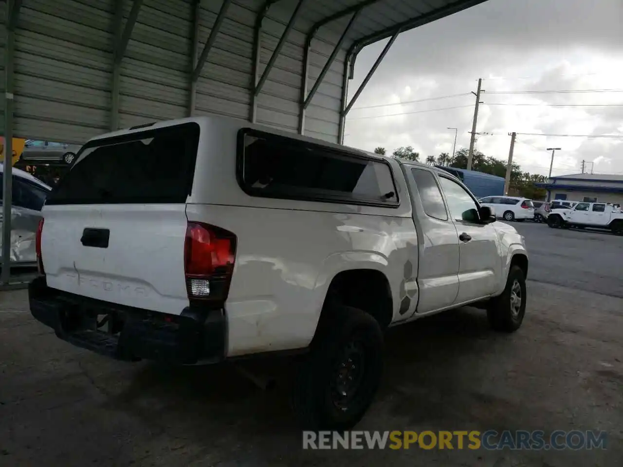 4 Photograph of a damaged car 5TFRX5GN2KX145388 TOYOTA TACOMA 2019