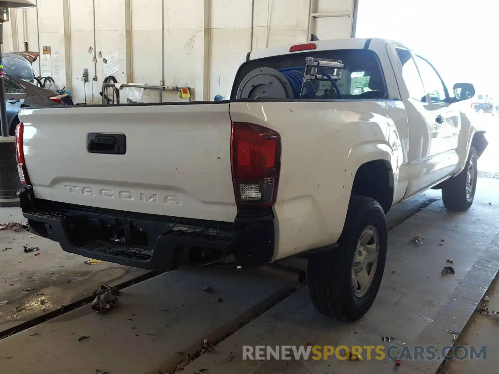 4 Photograph of a damaged car 5TFRX5GN4KX154058 TOYOTA TACOMA 2019