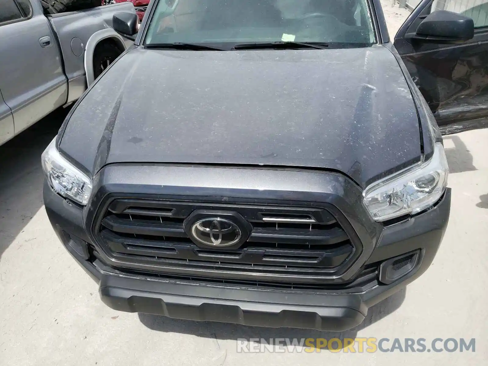 7 Photograph of a damaged car 5TFRX5GN4KX159017 TOYOTA TACOMA 2019