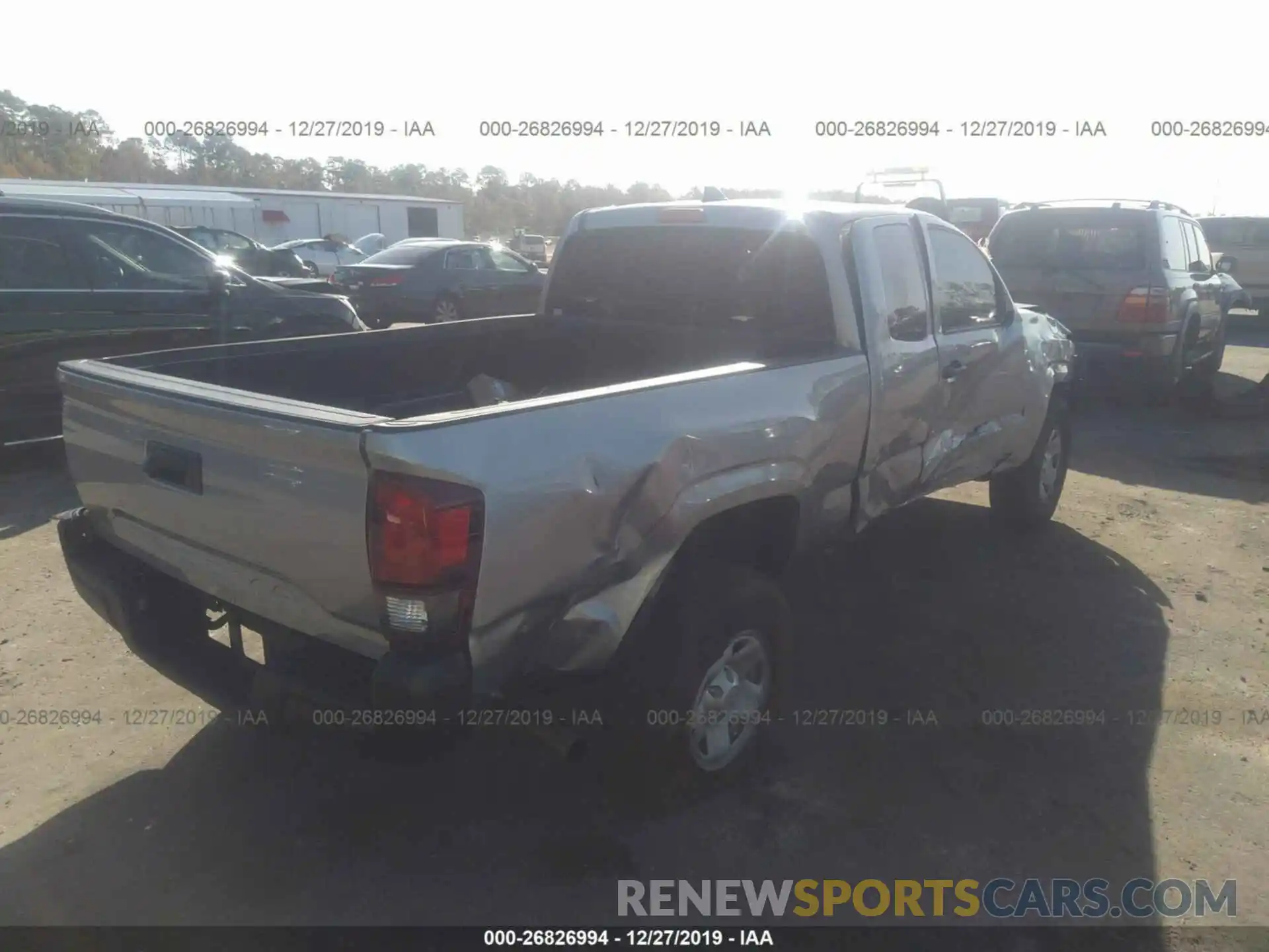 4 Photograph of a damaged car 5TFRX5GN5KX133493 TOYOTA TACOMA 2019