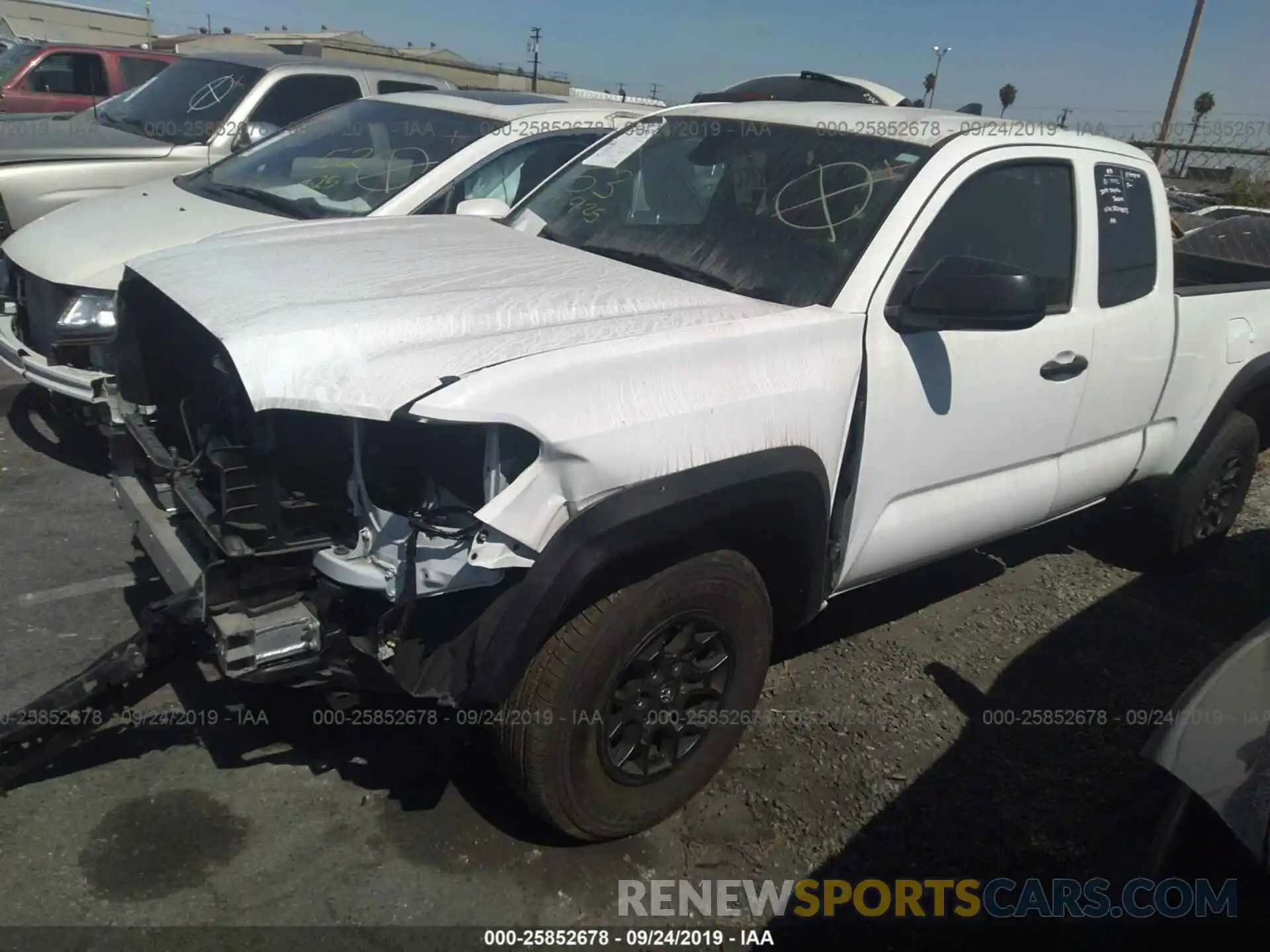 2 Photograph of a damaged car 5TFRX5GN5KX140573 TOYOTA TACOMA 2019