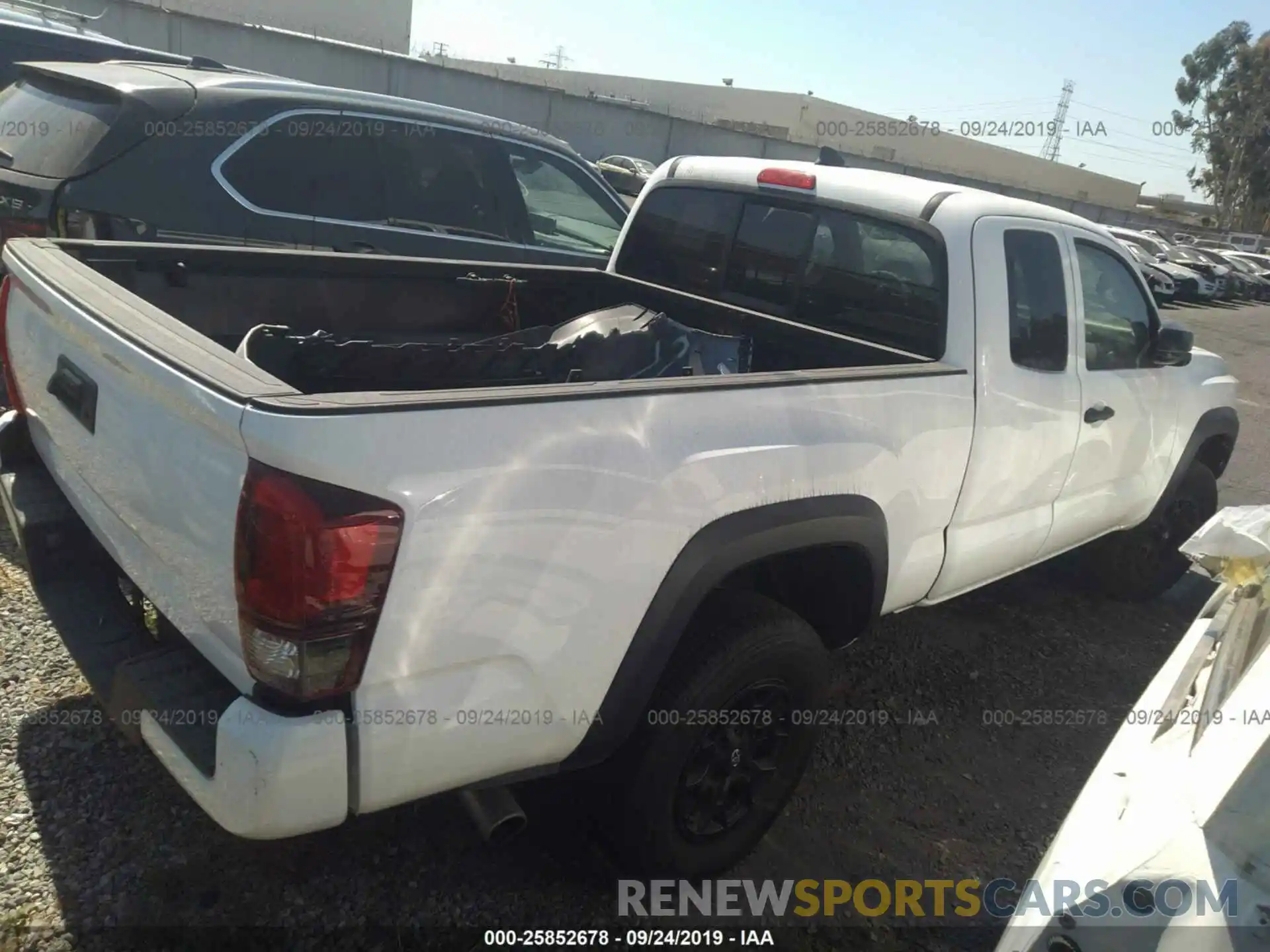 4 Photograph of a damaged car 5TFRX5GN5KX140573 TOYOTA TACOMA 2019