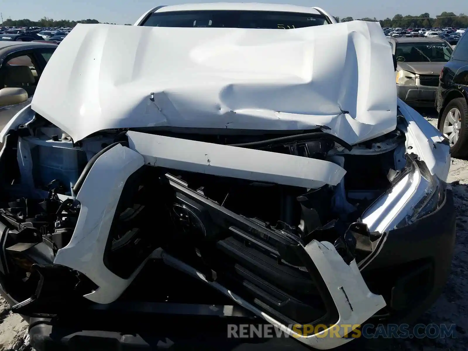 7 Photograph of a damaged car 5TFRX5GN5KX155011 TOYOTA TACOMA 2019