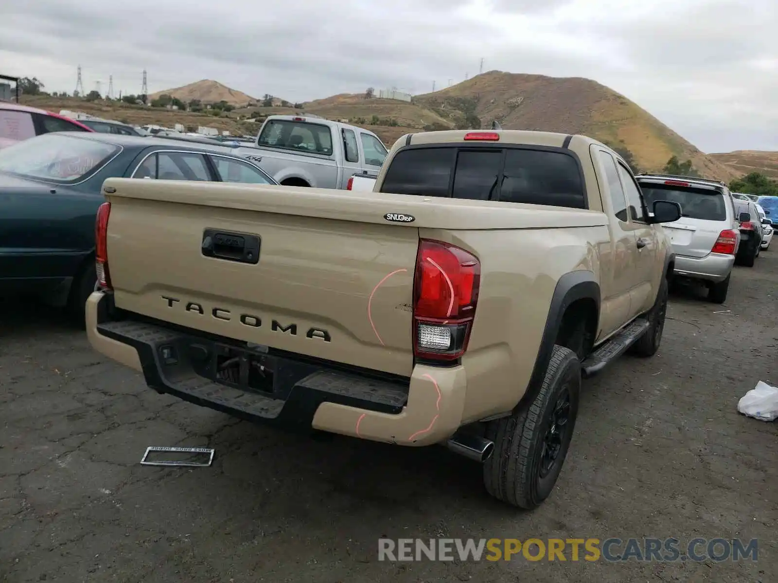 4 Photograph of a damaged car 5TFRX5GN5KX163383 TOYOTA TACOMA 2019