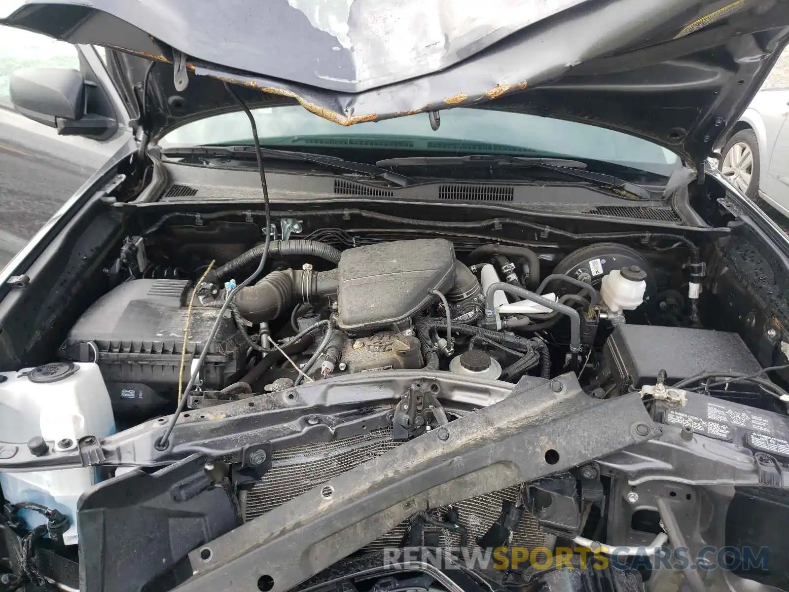 7 Photograph of a damaged car 5TFRX5GN6KX145877 TOYOTA TACOMA 2019