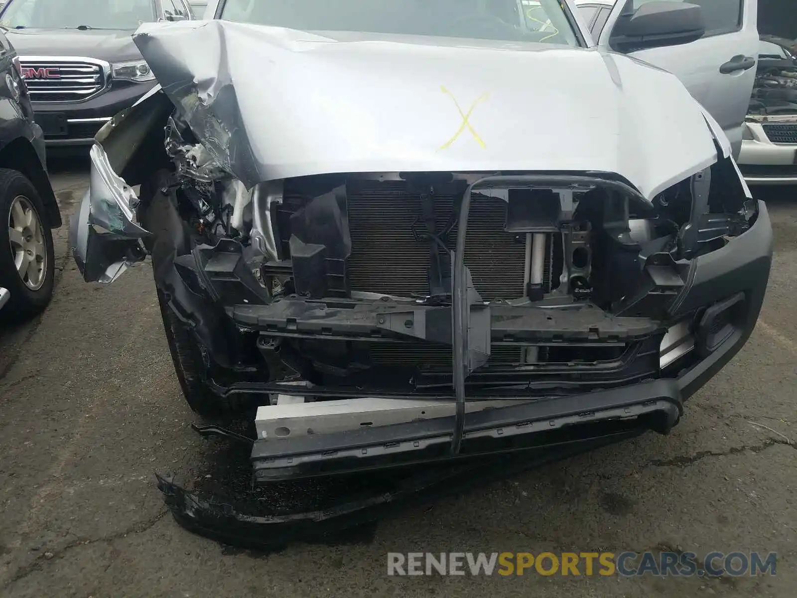 9 Photograph of a damaged car 5TFRX5GN6KX150559 TOYOTA TACOMA 2019