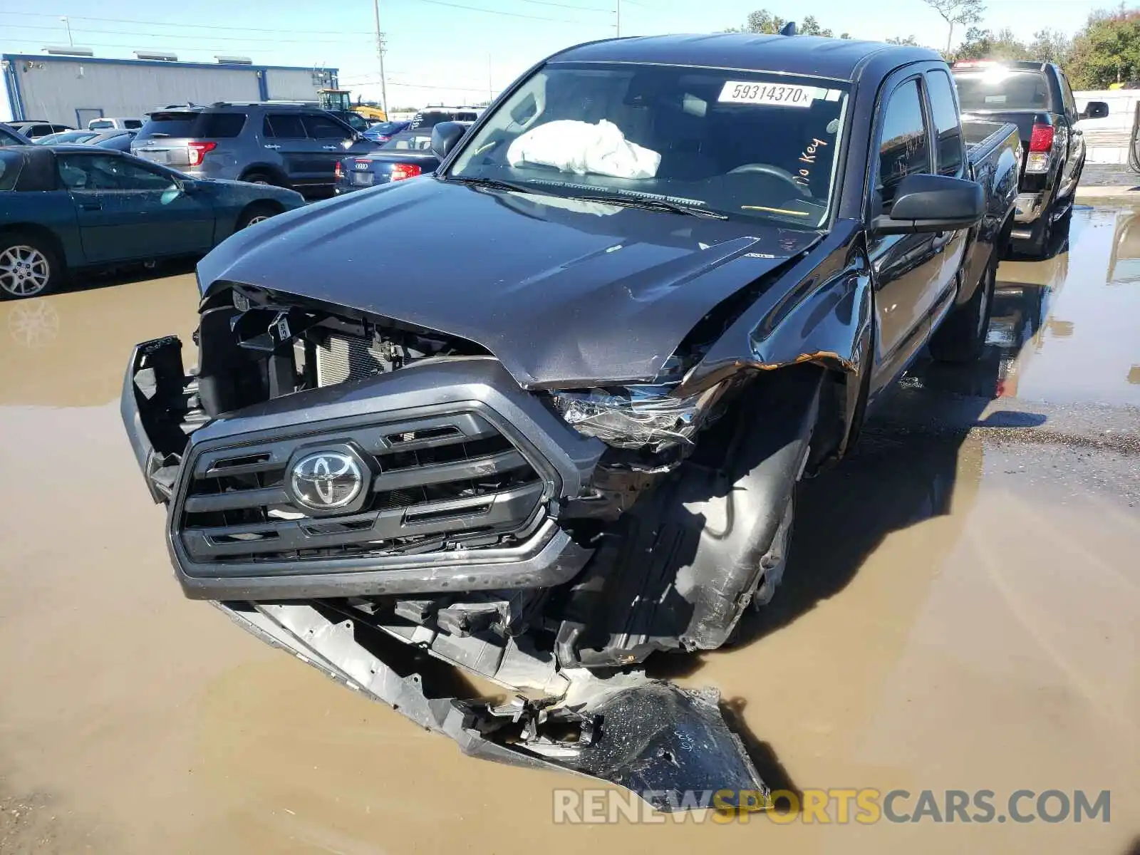 2 Photograph of a damaged car 5TFRX5GN7KX136413 TOYOTA TACOMA 2019