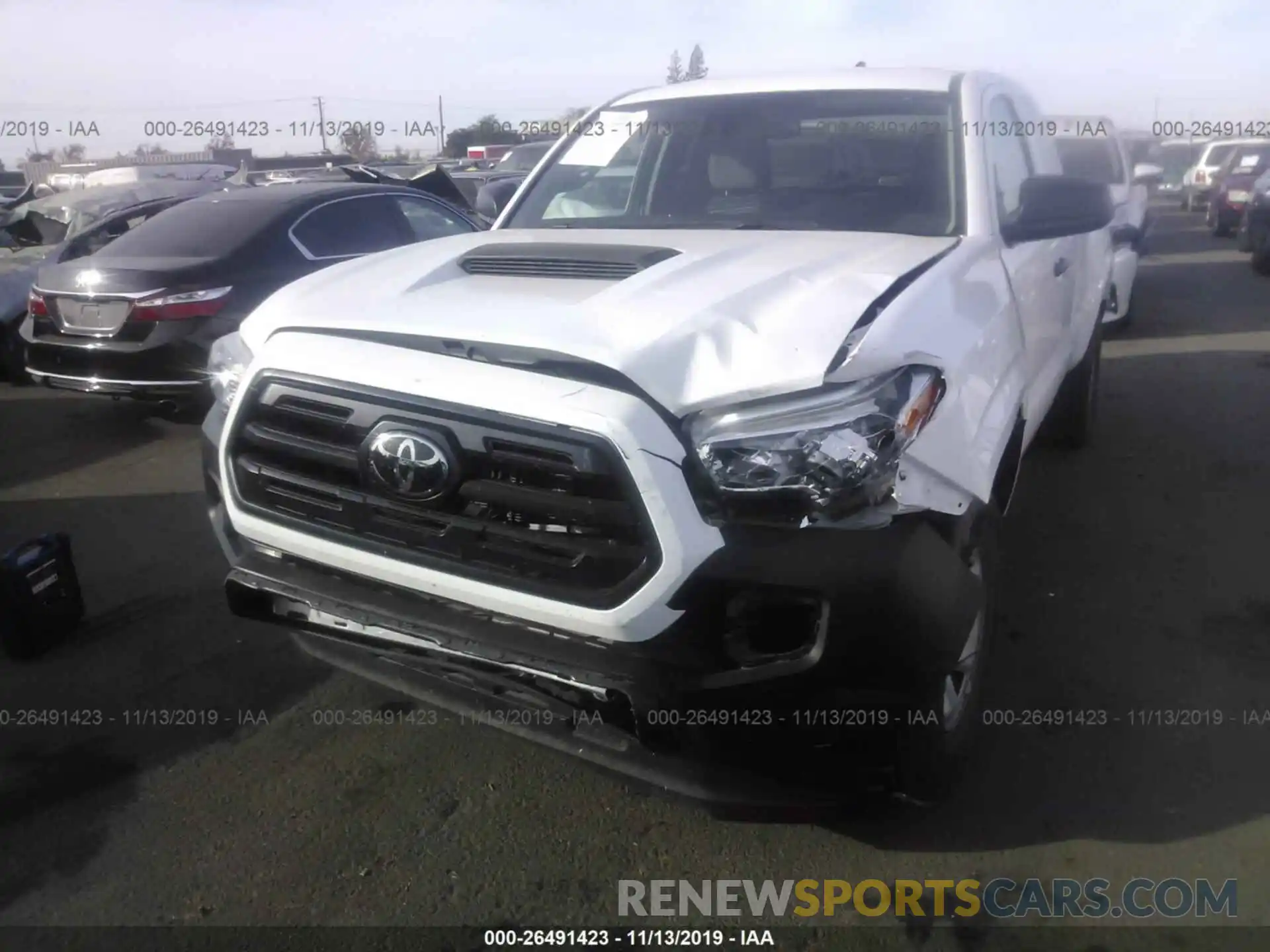 6 Photograph of a damaged car 5TFRX5GN7KX137108 TOYOTA TACOMA 2019