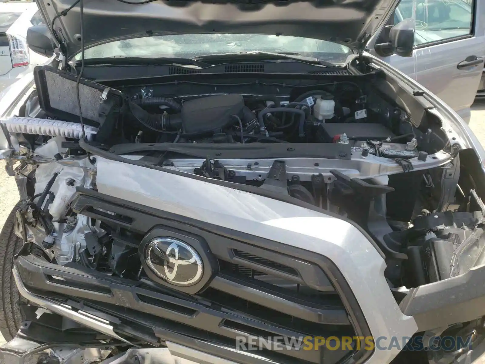 7 Photograph of a damaged car 5TFRX5GN8KX137120 TOYOTA TACOMA 2019