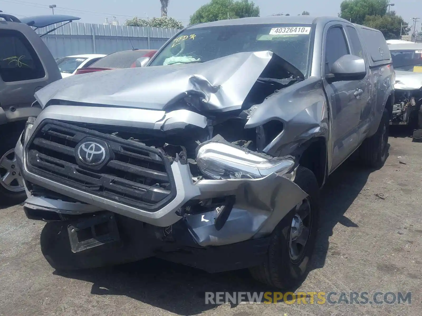 2 Photograph of a damaged car 5TFRX5GN9KX146036 TOYOTA TACOMA 2019