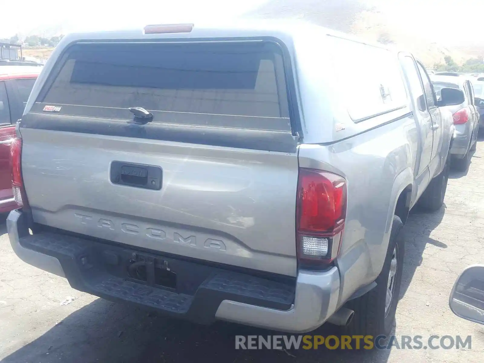 4 Photograph of a damaged car 5TFRX5GN9KX146036 TOYOTA TACOMA 2019