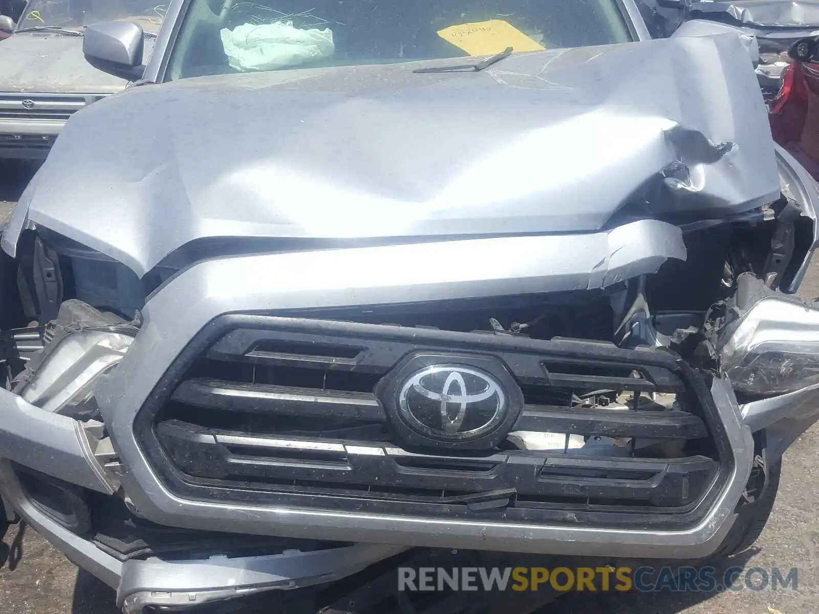 7 Photograph of a damaged car 5TFRX5GN9KX146036 TOYOTA TACOMA 2019