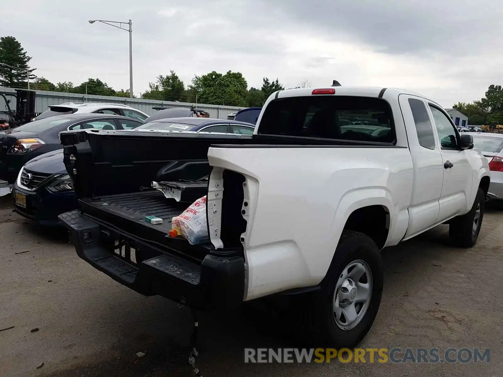 4 Photograph of a damaged car 5TFRX5GN9KX155223 TOYOTA TACOMA 2019