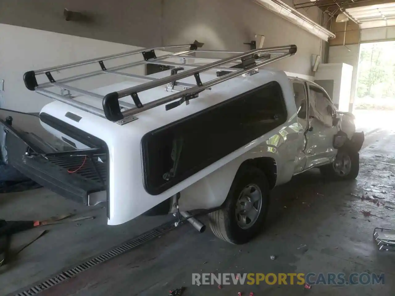 4 Photograph of a damaged car 5TFRX5GN9KX162866 TOYOTA TACOMA 2019